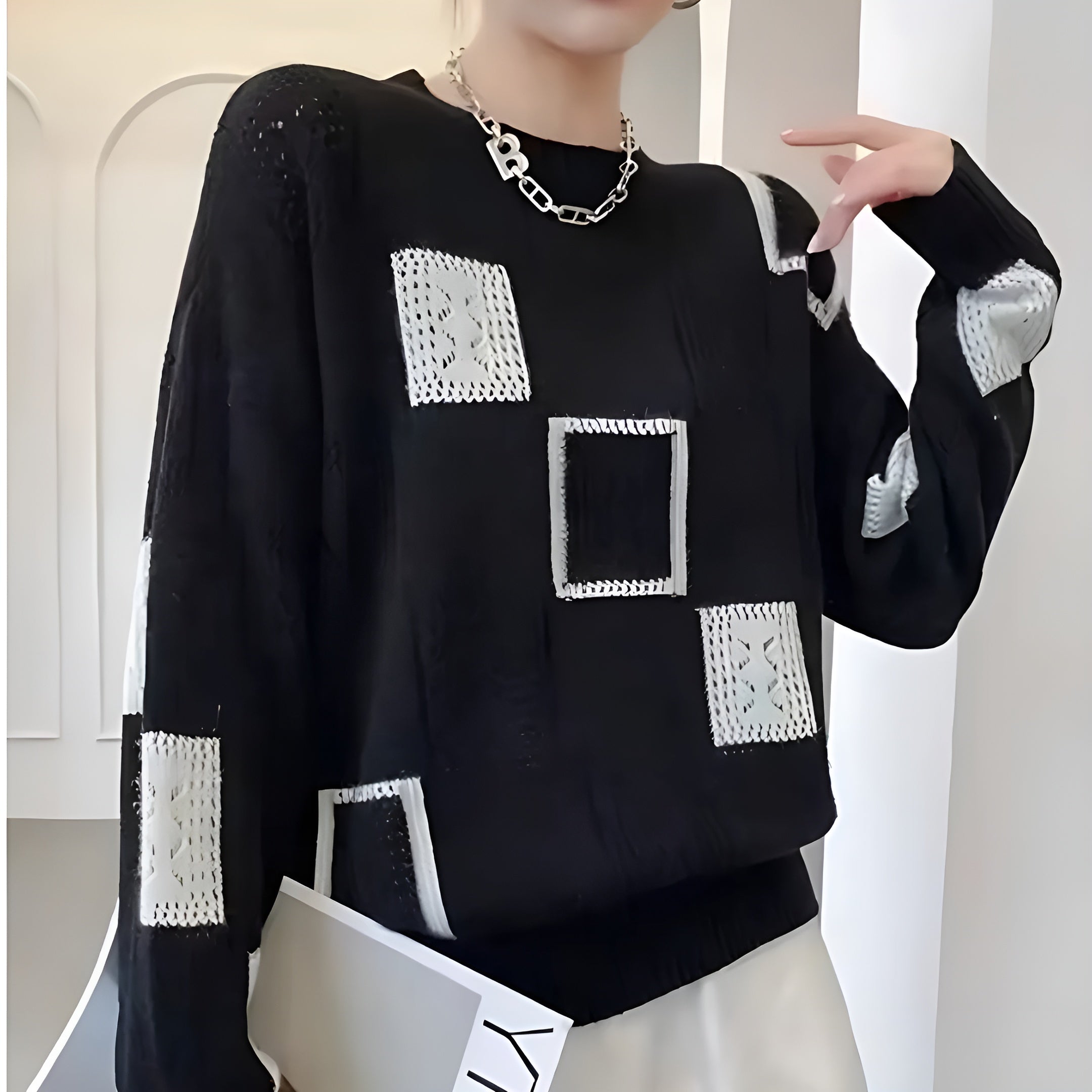 Avora Lyon | Elegantný pulóver s geometrickými priedušnými vzormi