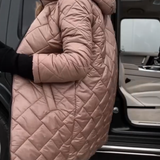 Veylaria | Elegantný prešívaný pufr s kapucňou